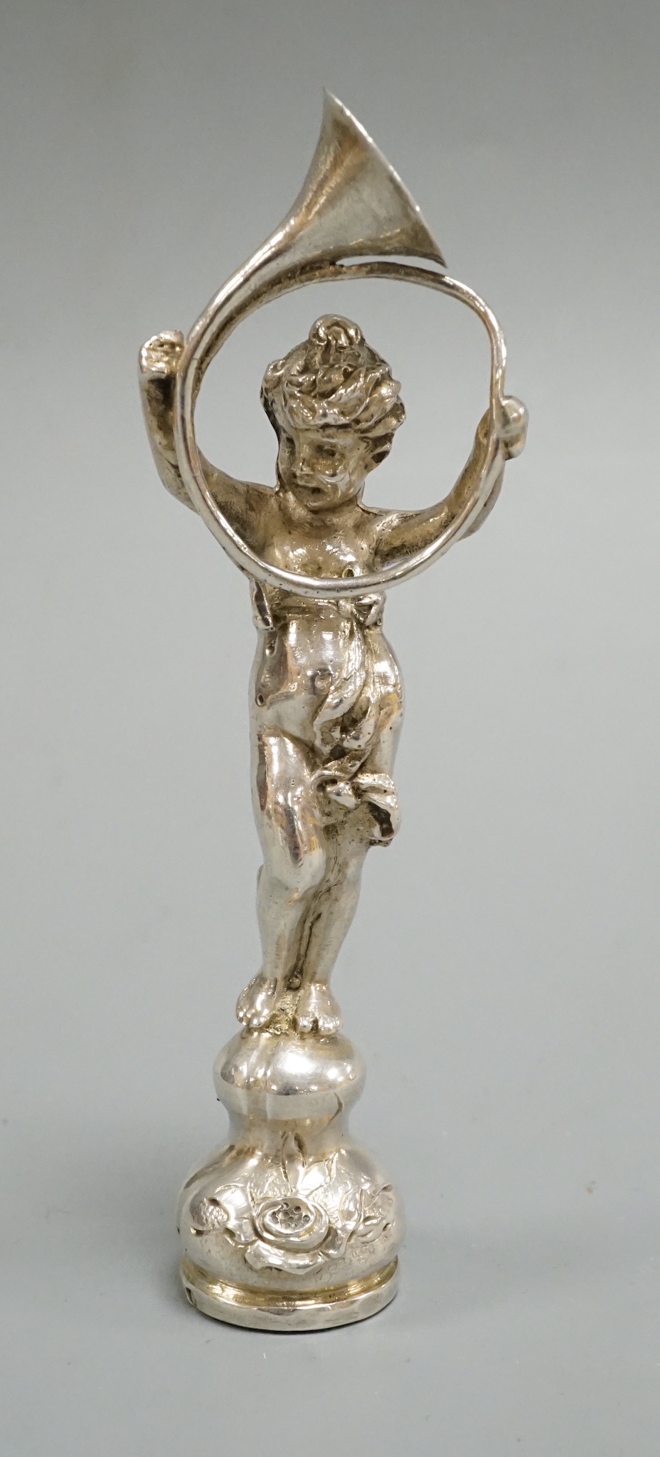 A late 19th century continental silver figural desk seal, import marks for Berthold Muller, London, 1894, 9cm.